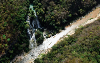 See the El Aguacero Waterfall